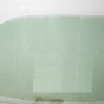 LH REAR DOOR GLASS GREEN - NO FITTINGS